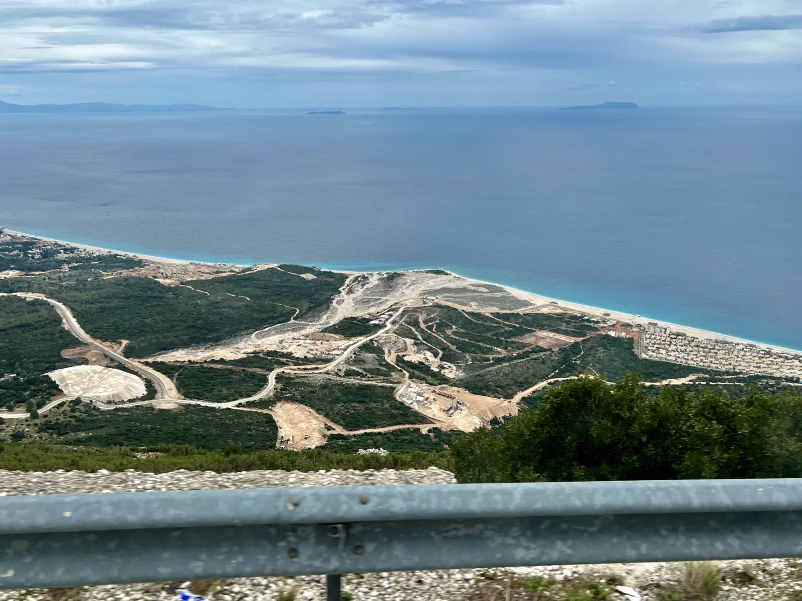 Coastal road above Palasa beach on the Albanian Riviera, seen from the Llogara Pass